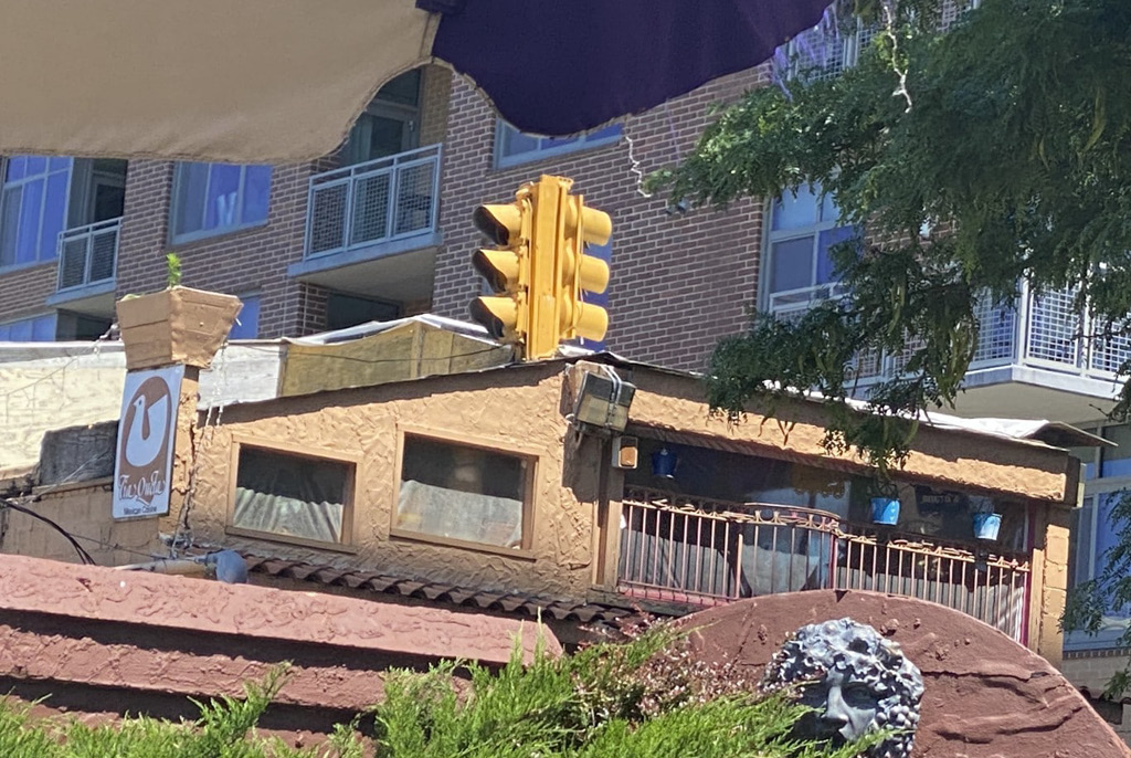 Unique building tucked away above a road