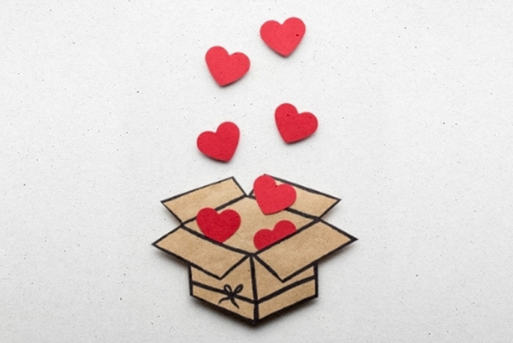 Box with hearts coming out of it